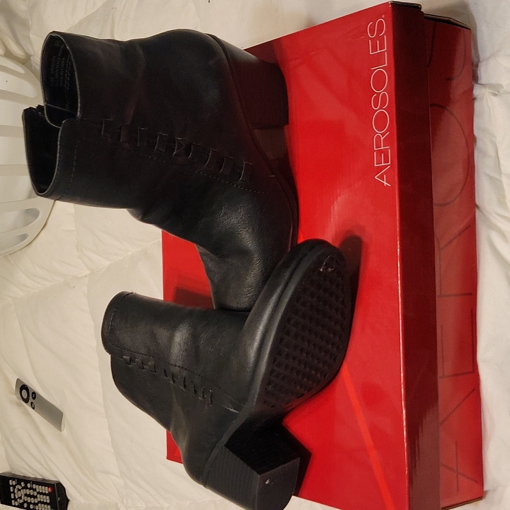 Black heeled ankle boots.